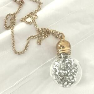 Holiday festive Christmas necklace loose sparkles in the clear ball 12”length